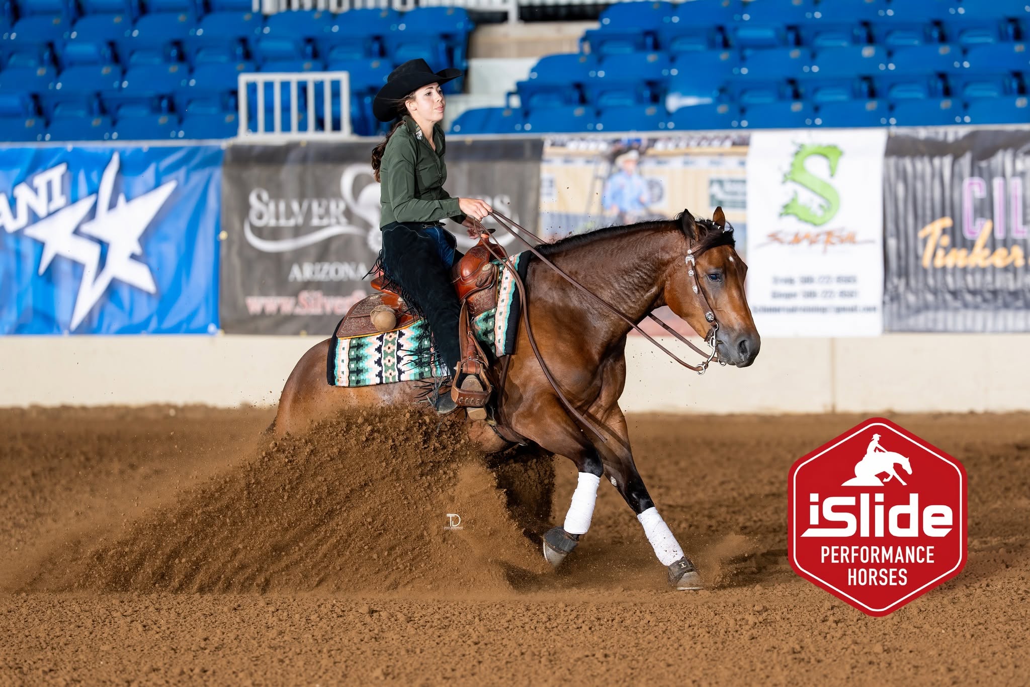 Sarah Messer riding Maggie in a sliding stop